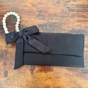 Elegant Black Clutch with Pearl Handle